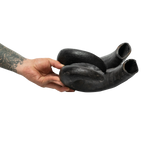 Tattooed hand holding two black bull horns, isolated on white background