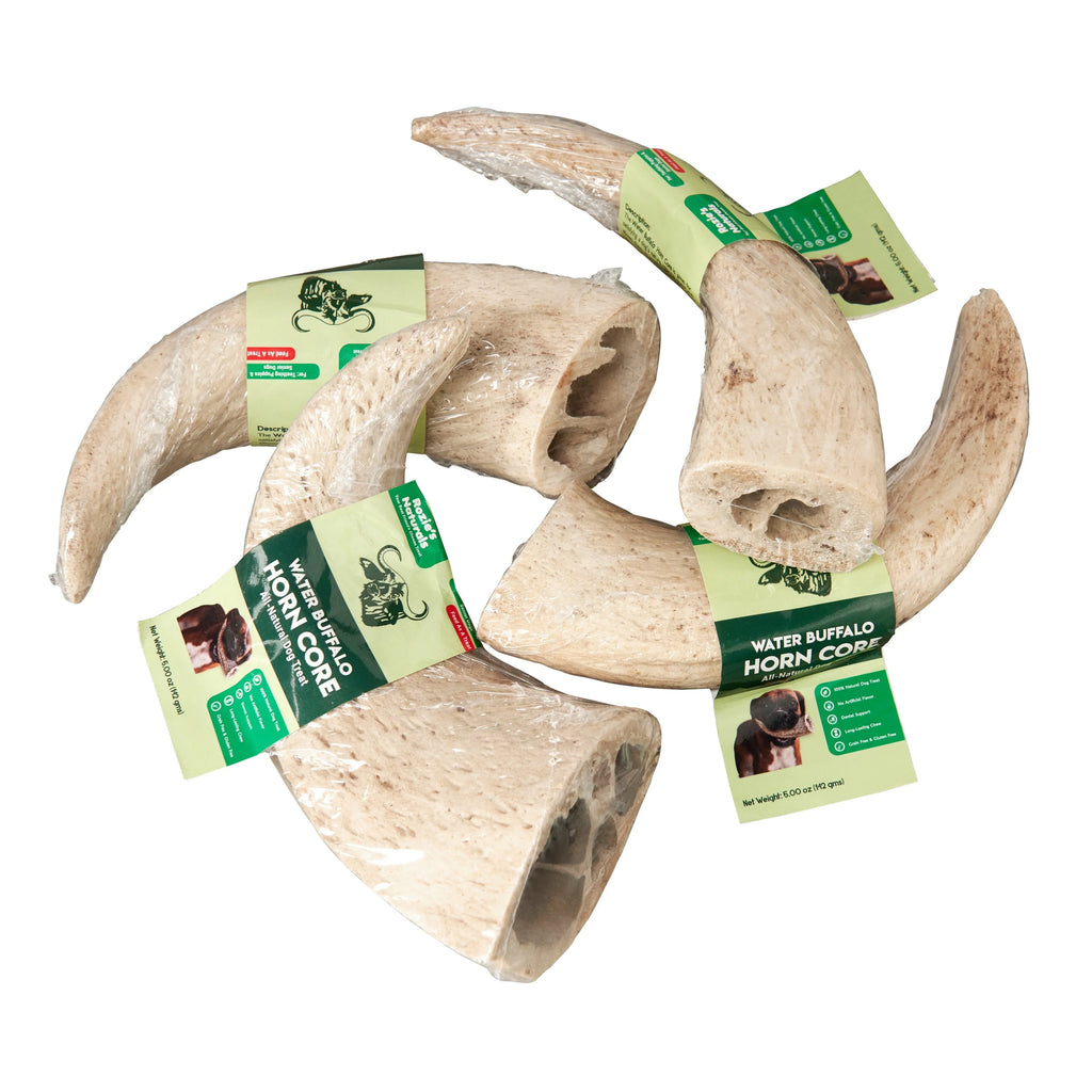 Natural water buffalo horn core dog chews with green and beige labels for dental health