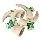 Natural water buffalo horn core dog chews with green and beige labels for dental health
