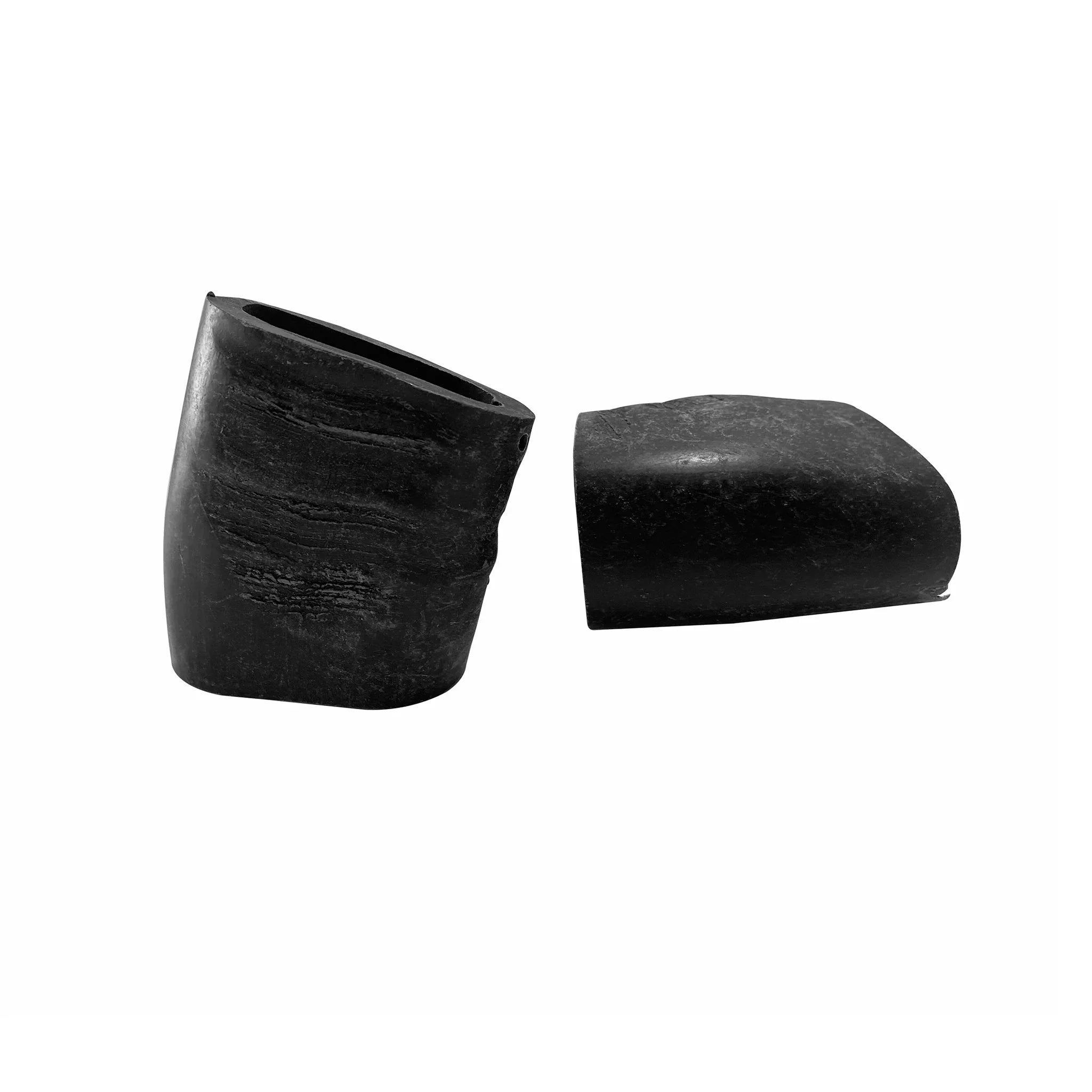 Black broken ceramic or stone vase with a textured surface on white background