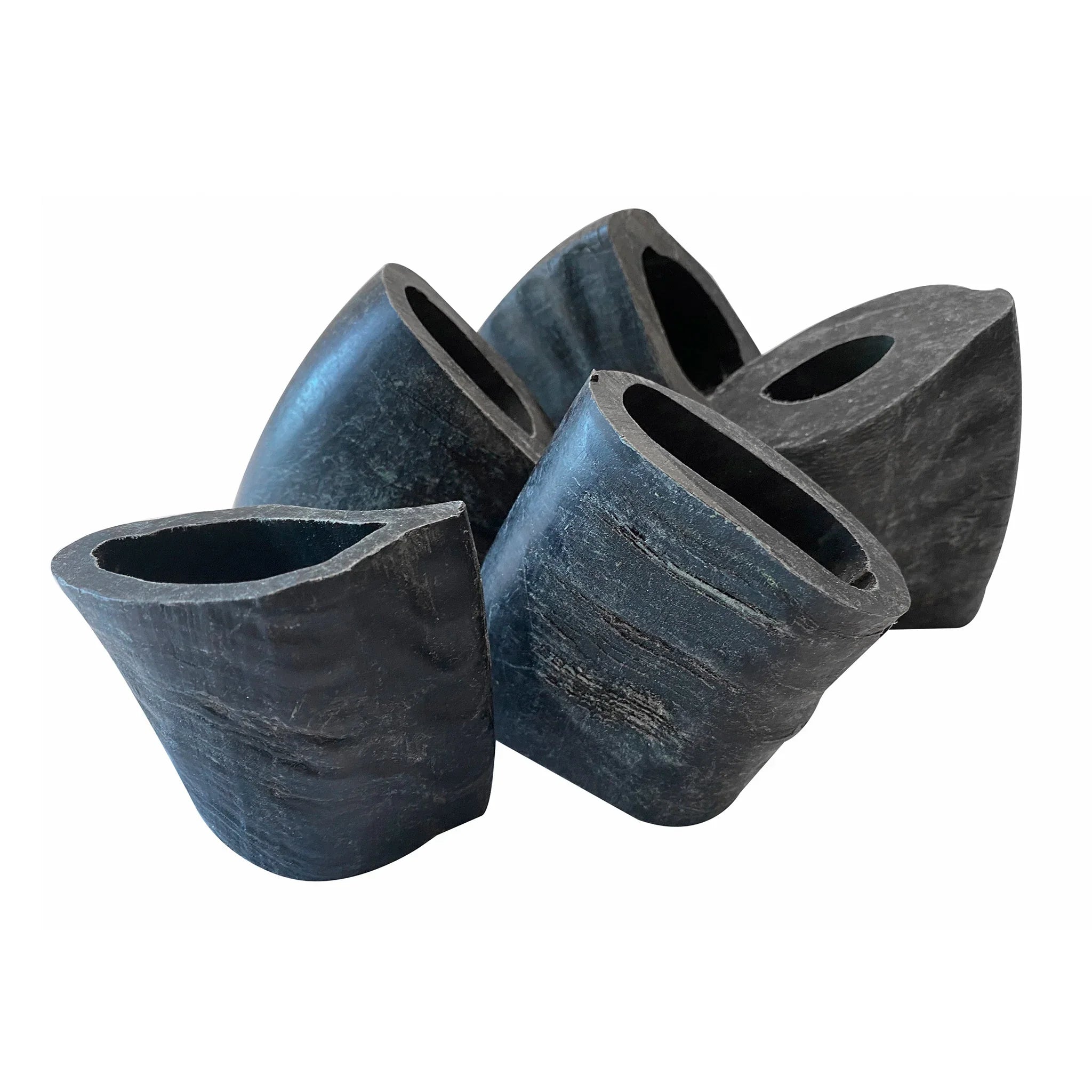 Set of five black rubber pipe end caps isolated on white background