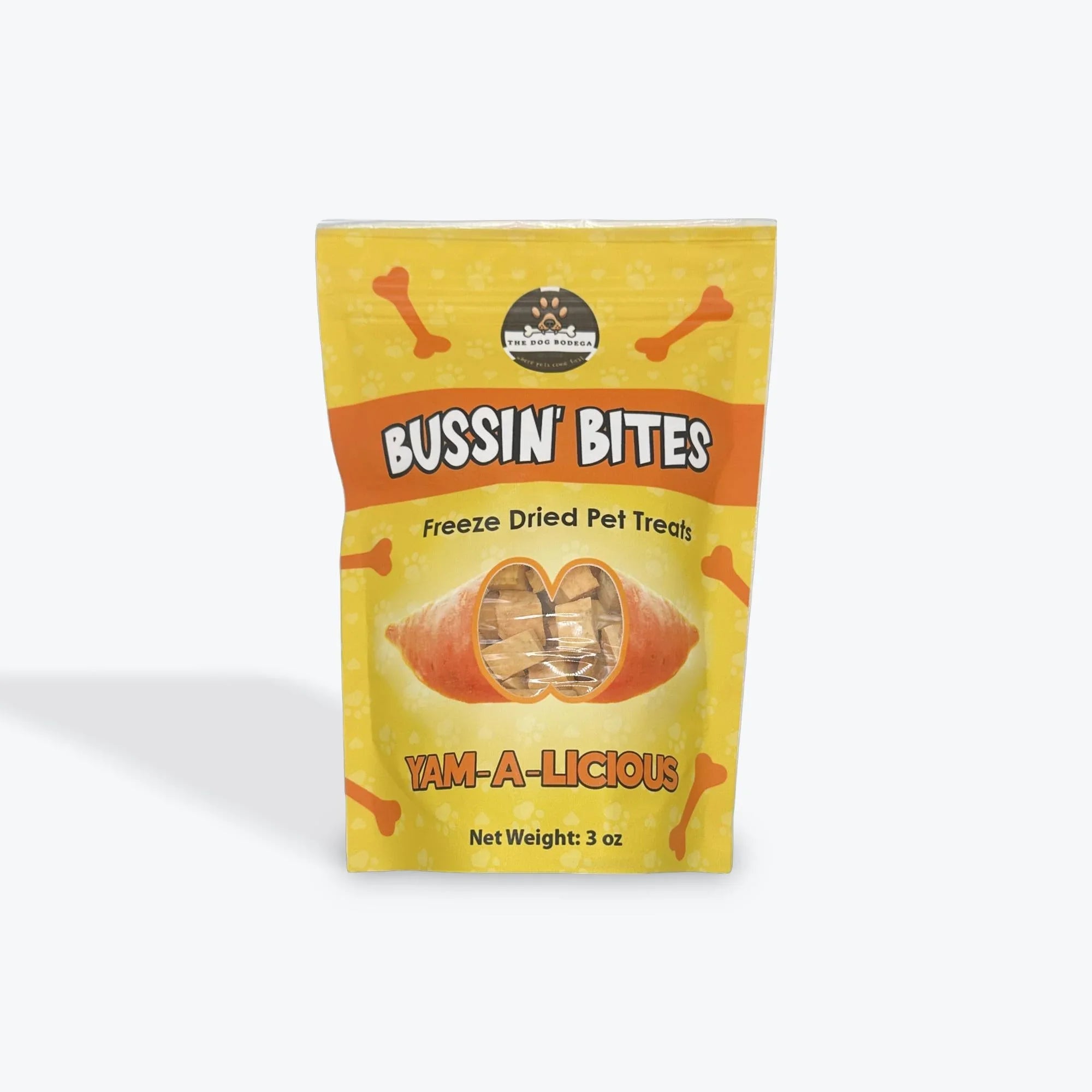 Bussin' Bites Yam-A-Licious freeze dried pet treats in yellow and orange packaging with dog bone designs