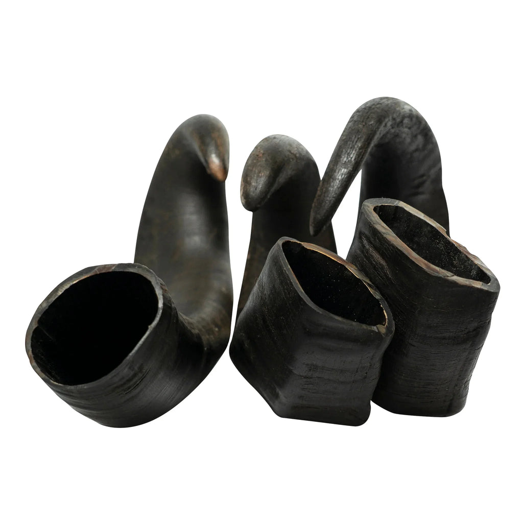 Set of three black wooden smoking pipes with curved stems on white background