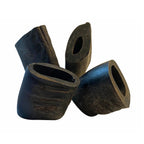 Close-up of four hollowed, dark wooden blocks with rough texture on white background