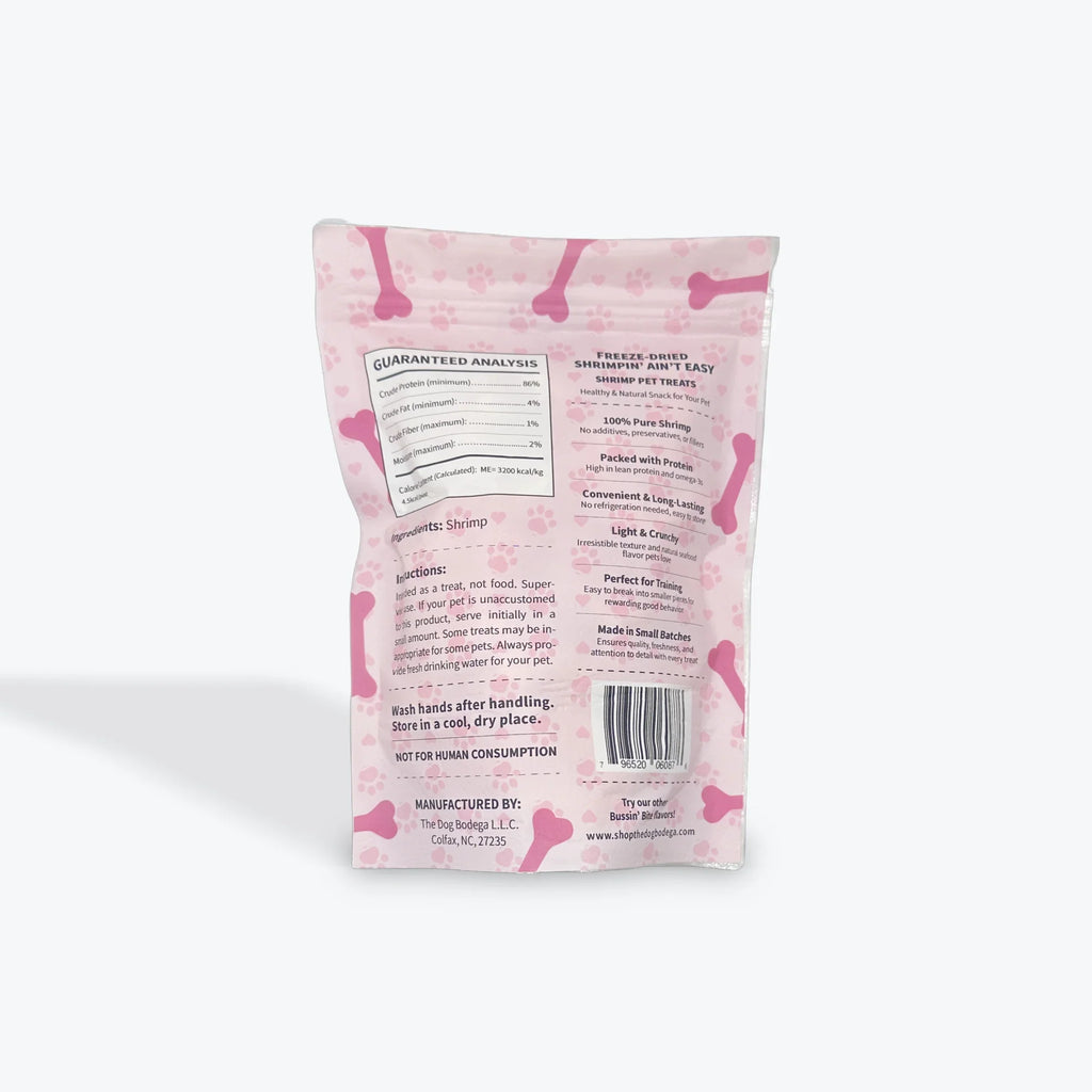 Back of pink dog treat bag with bone and paw prints, freeze-dried shrimp pet treats information